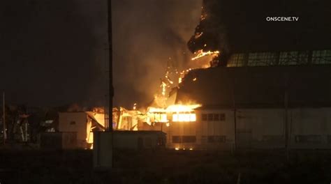 2nd flare-up reignites at historic hangar in Orange County
